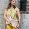 Blouse mouwloos geel wit zonnebloem dessin | DELSCHER. Fashion