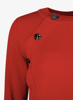 Pull kross rood met knoop detail | DELSCHER. Fashion